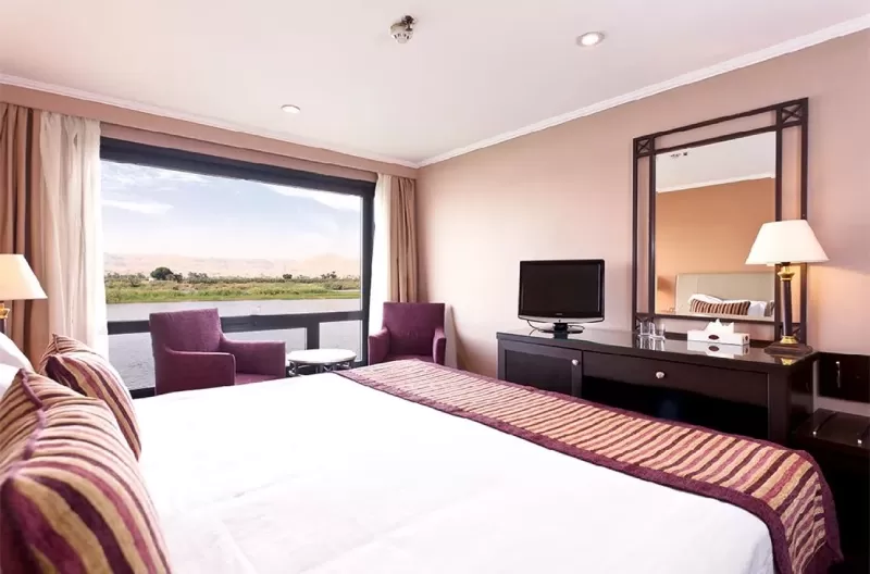 Relax in your comfortable cabin aboard the Jaz Crown Prince Nile Cruise